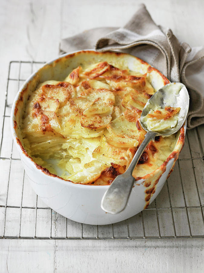 Gratin Potato Dauphinoise Cut Into To Show Cream And Butter Ingredients Photograph by Michael Paul