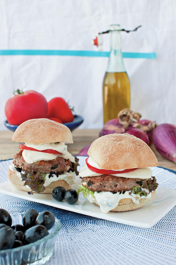 Greek Burgers With Feta Cheese, Olives And Mozzarella Photograph by Tre Torri
