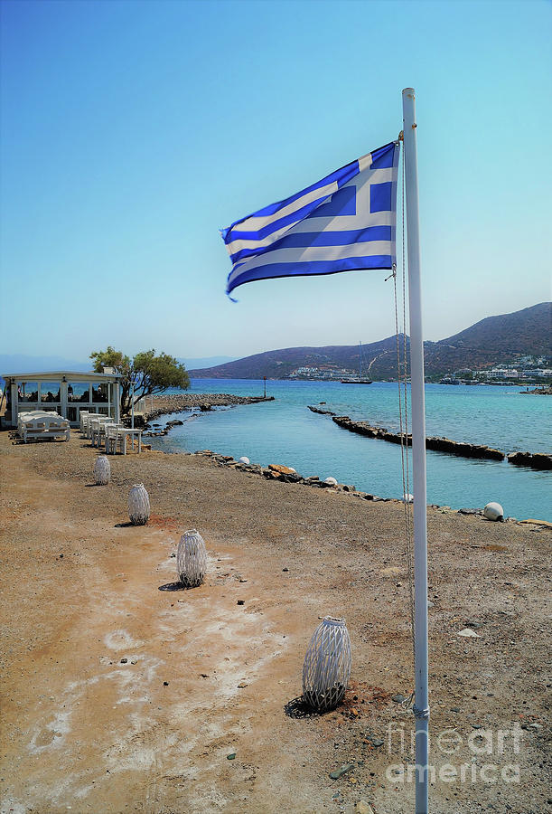 Greek Flag On The Beach In Elounda Photograph