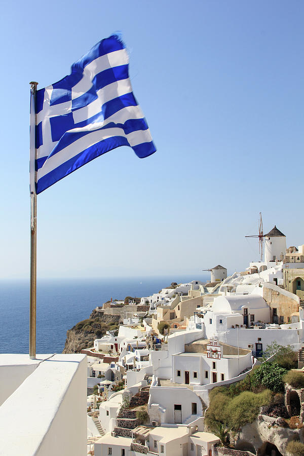 Greek Flag Waving By Sea Against Town And Clear Sky Photograph by Cavan Images Greek Flag Waving By Sea Against Town And Clear Sky Photograph by Cavan Images