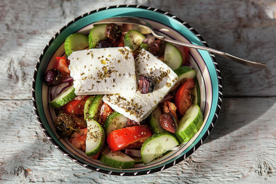 Greek Salad With Feta, Cucumbers, Tomatoes And Olives Photograph by Lara Jane Thorpe