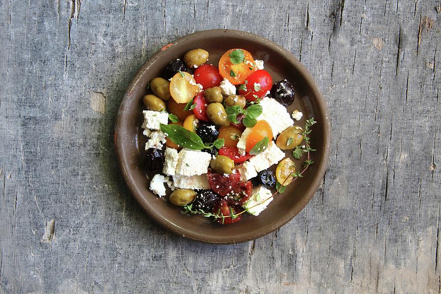 Greek Salad With Olives And Feta Cheese Photograph by Milly Kay