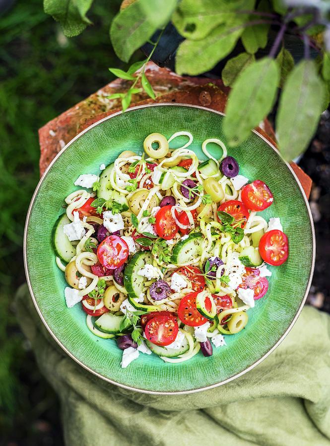 Greek Salad With Spiralized Courgette, Tomatoes, Cucumber, Feta Cheese And Olives Photograph by Lucy Parissi