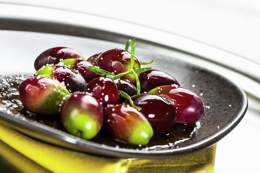 Green And Red Olives On A Plate Photograph by Twellmann, Birgit