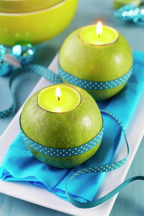 Green Apples Used As Tealight Holders Photograph by Franziska Taube