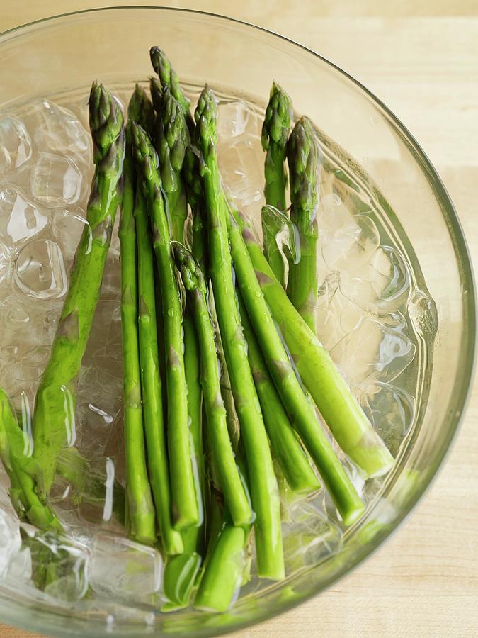 Green Asparagus In Iced Water Photograph by Jim Franco Photography ...