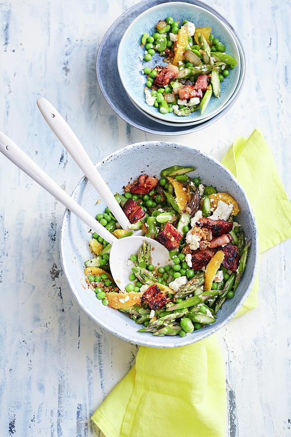 Green Asparagus Salad With Peas, Oranges, Bacon And Feta Photograph by Stockfood Studios /  Thorsten Suedfels