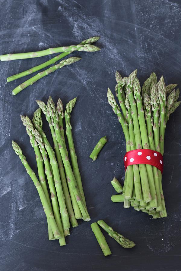 Green Asparagus, Some In Bunches Photograph by Adel Bekefi