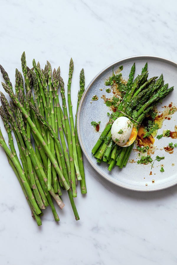Green Asparagus With A Poached Egg Photograph by Akiko Ida