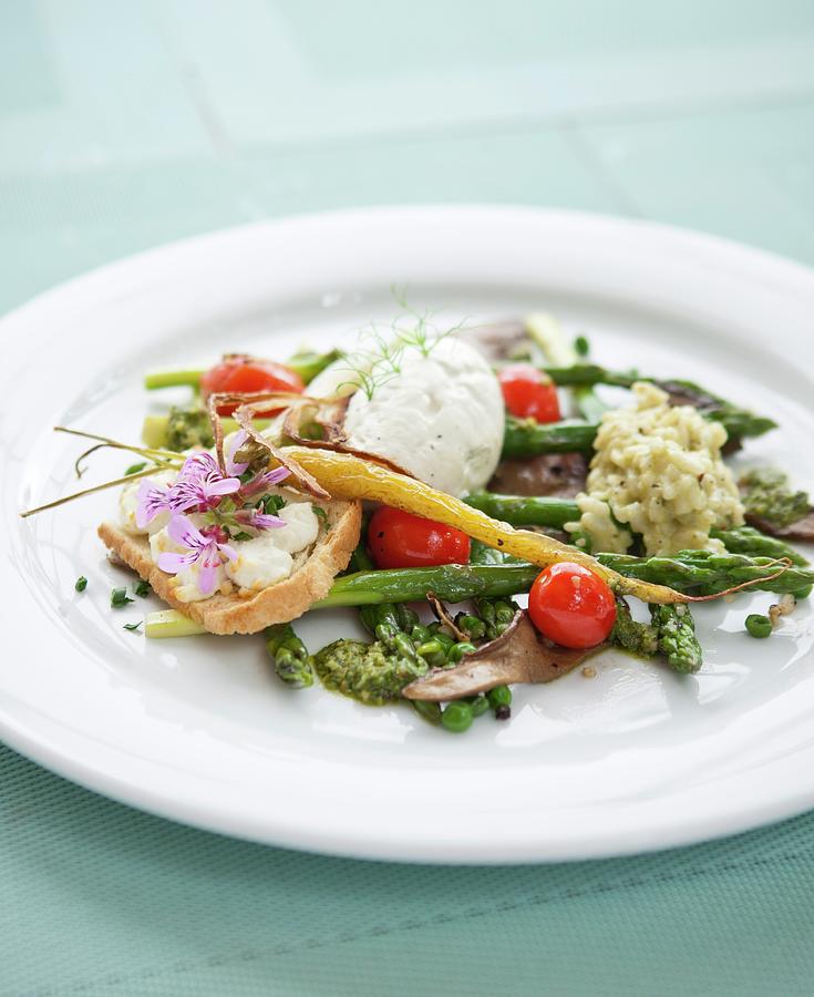 Green Asparagus With A Sage, Stinging Nettle And Garlic Pesto, Risotto And Cream Cheese Photograph by Great Stock!