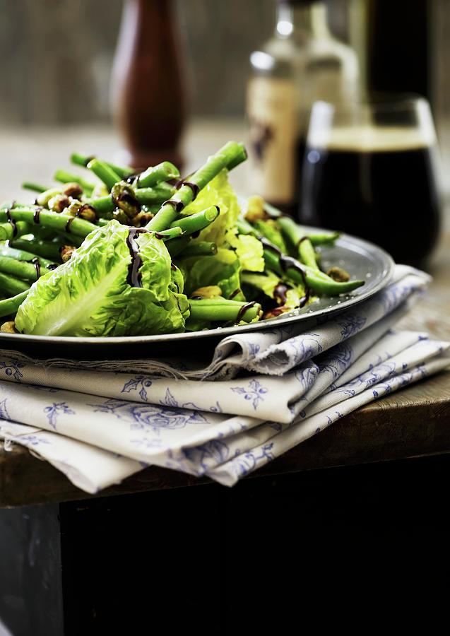 Green Beans And Cos Lettuce With Balsamic Cream And Pistachio Nuts Photograph by Mikkel Adsbl
