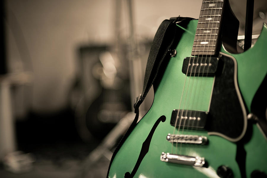 Green Electric Guitar With Blurry Photograph by Sean Molin - Www.seanmolin.com