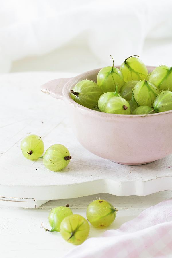 Green Gooseberries In A Bowl Photograph by Dees Kche