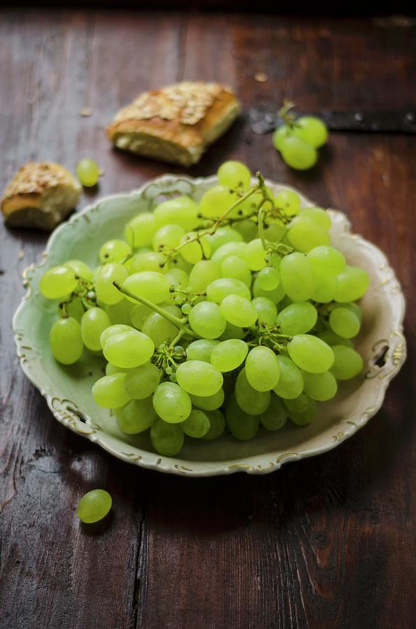 Green Grapes And Slices Of Bread Photograph by Aniko Szabo