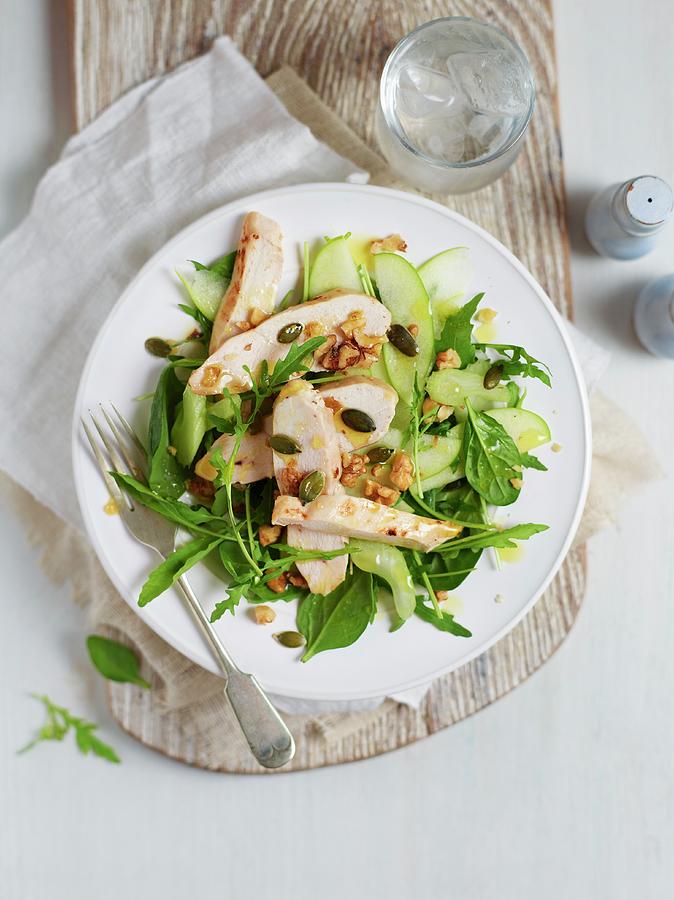 Green Herb Salad With Chicken, Apple And A Nut Dressing Photograph by Charlie Richards