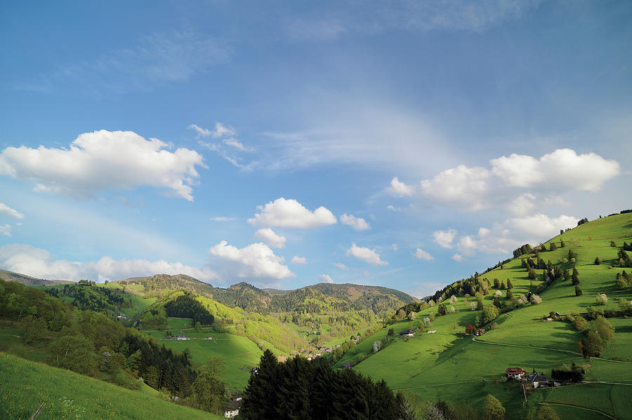 Green Hilly Landscape Below Blue Sky With Clouds Photograph by Tre Torri