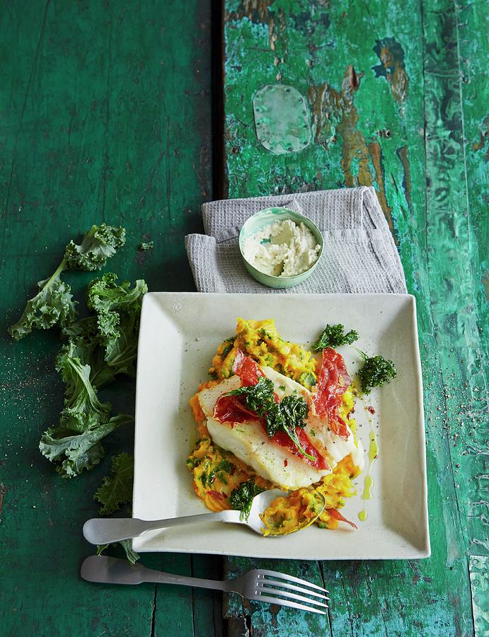 Green Kale And Pumpkin Mash With Cod And Horseradish Sour Cream Photograph by Jalag / Julia Hoersch