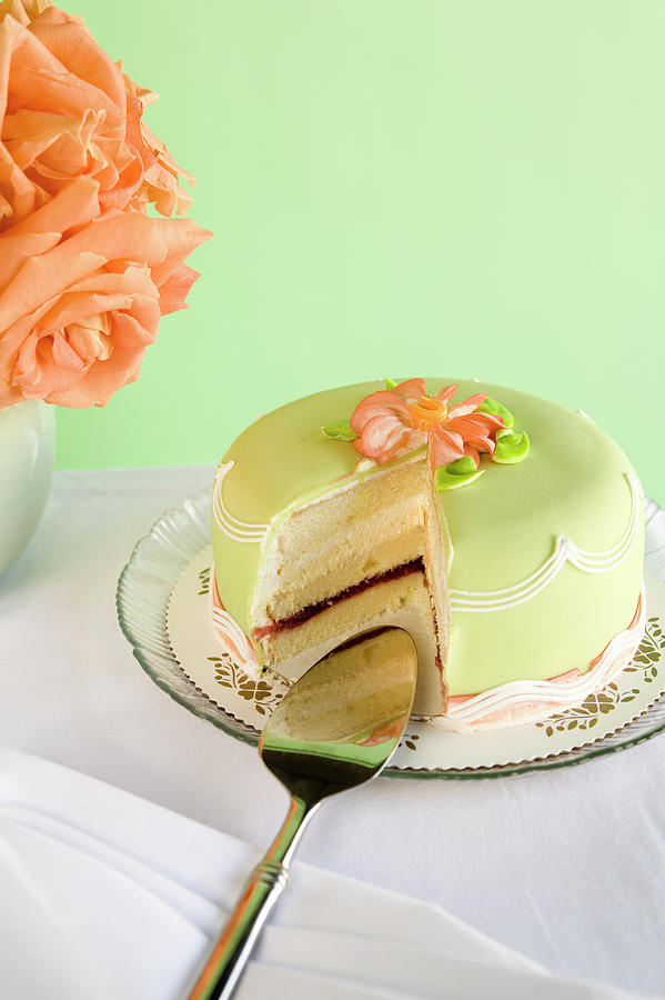 Green Marzipan Cake With Missing Slice Photograph by Seth Joel