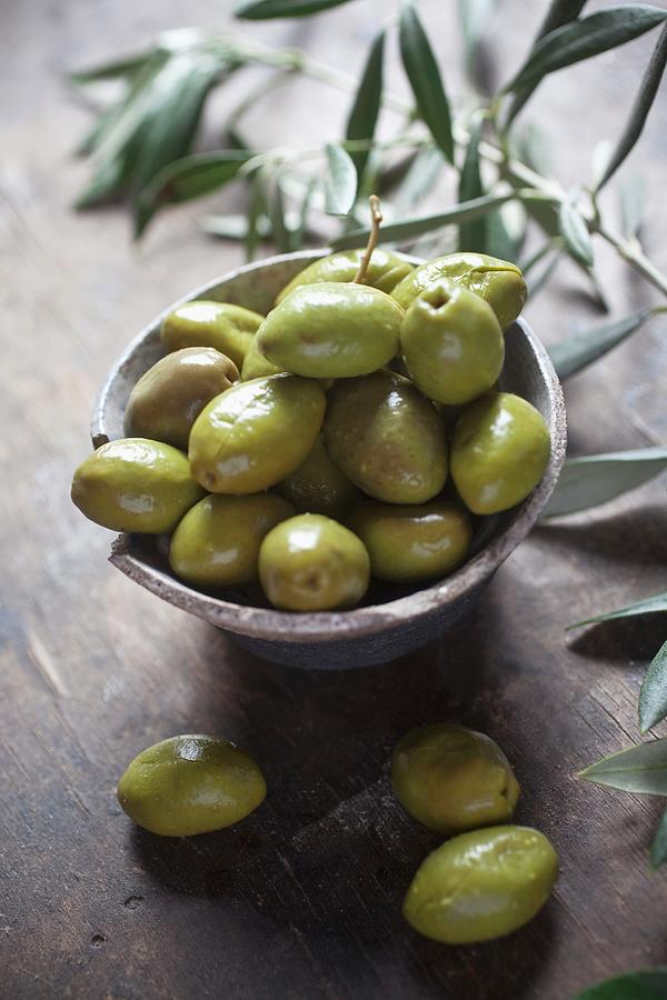 Green Olives In A Ceramic Dish Photograph by Stepien, Malgorzata