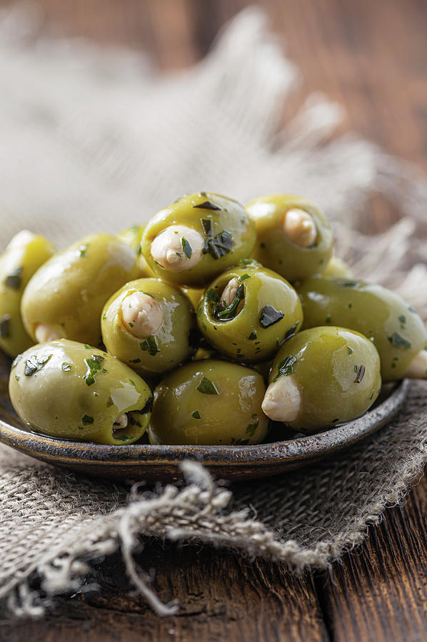 Green Olives With Herbs, Stuffed With Almonds Photograph by Anna Jakutajc-wojtalik