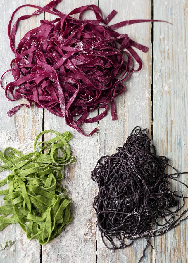 Green Pasta With Spinach, Red Pasta With Beetroot And Black Pasta With Squid Ink Photograph by Great Stock!