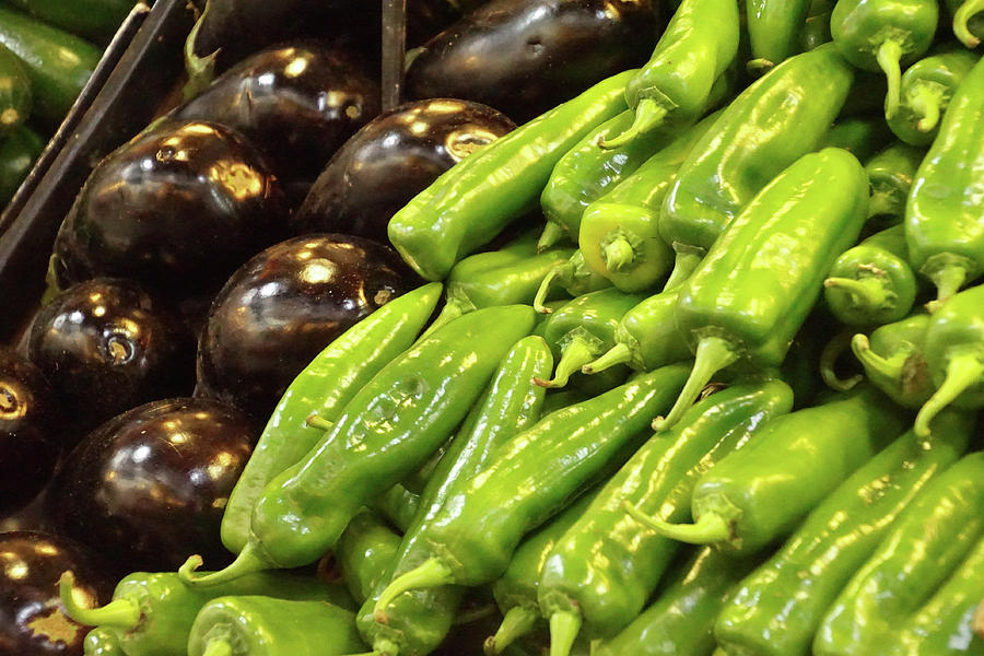 Green peppers and eggplant in the Mercado de Atarazanas Photograph by Steve Estvanik