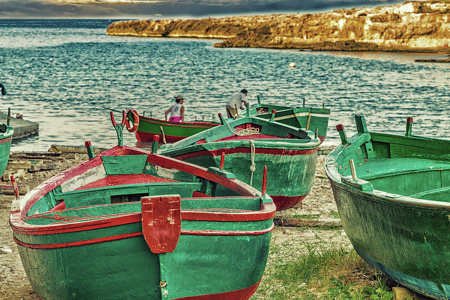 Green rowing boats on the beach Photograph by Vivida Photo PC