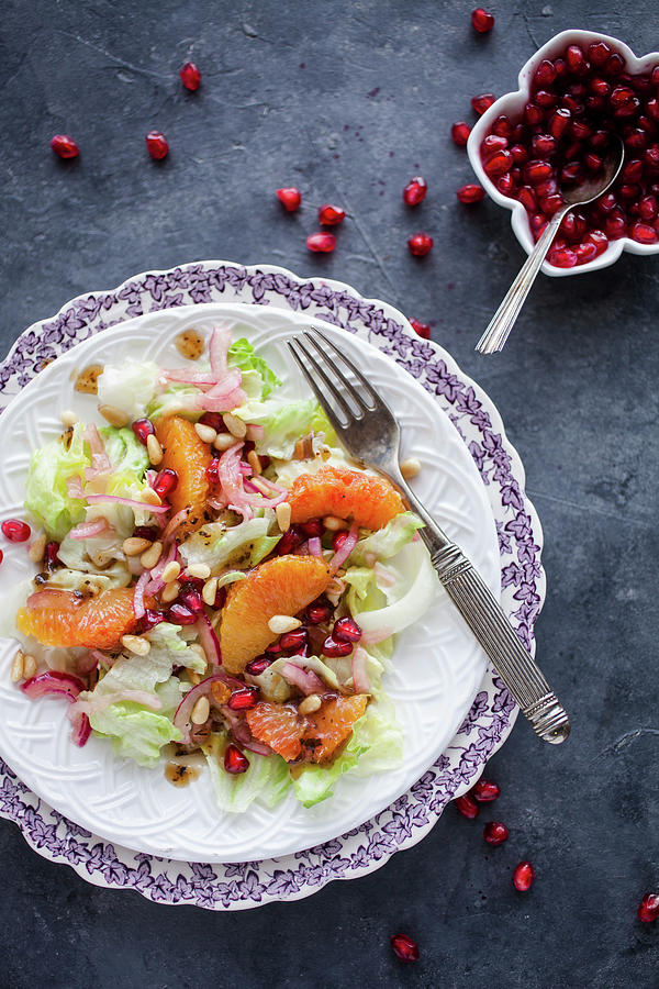 Green Salad With Oranges And Pomegranate Photograph by Kati Finell