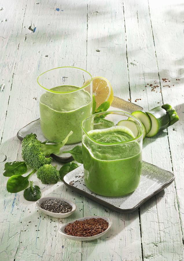 Green Smoothies: A Broccoli And Apple Smoothie And A Spinach And Kiwi Smoothie Photograph by Karl Newedel
