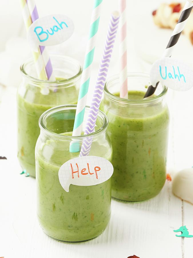 Green Smoothies For Halloween Decorated With Straws And Speech Bubbles Photograph by Hannah Kompanik