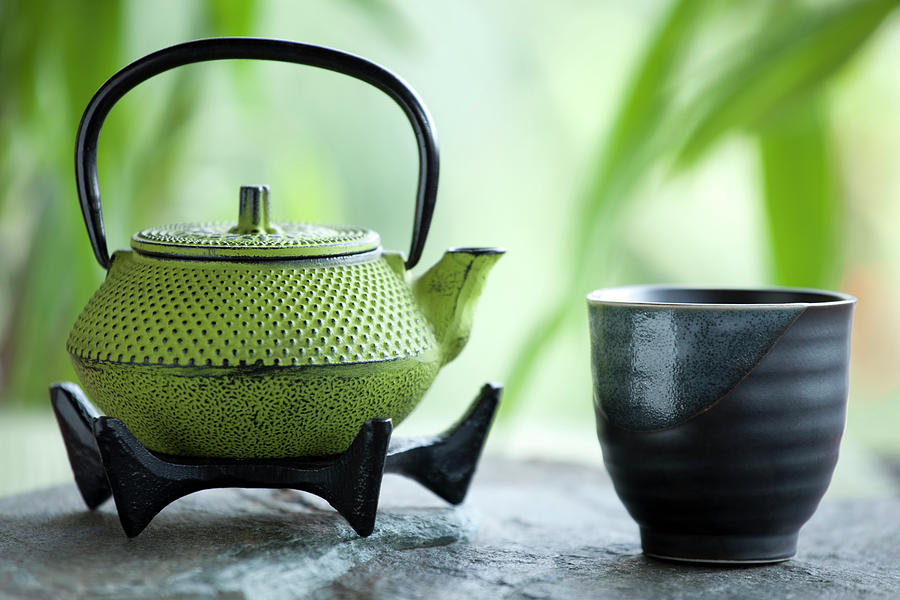 Green Tea And Cast Iron Teapot Photograph by Marsbars
