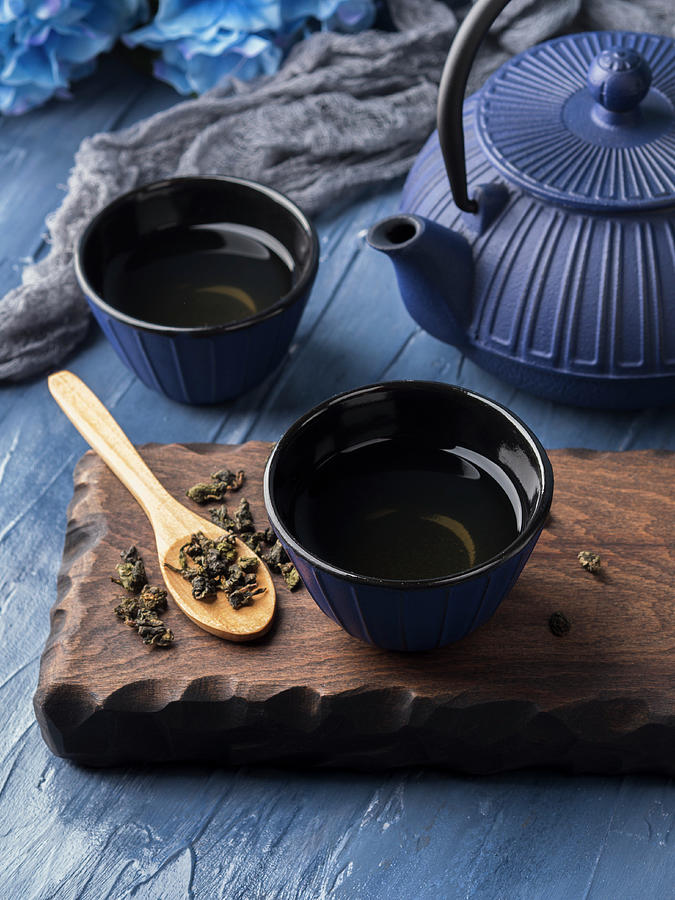 Green Tea In Blue Cups With Blue Cast Iron Tea Pot Photograph by Sofya Bolotina