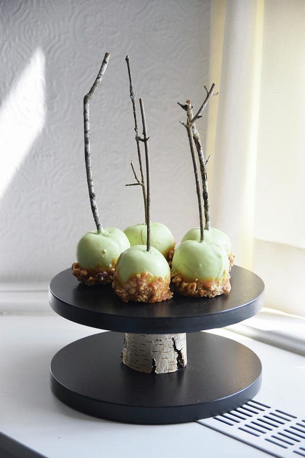 Green Toffee Apples On Twigs Photograph by So Schmeckt Liebe