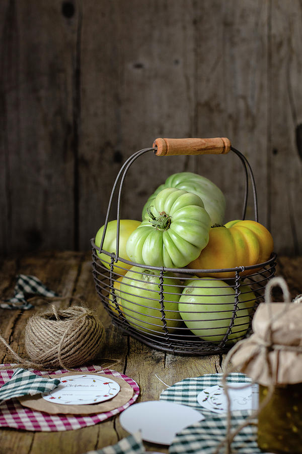 Green Tomatoes In A Basket Photograph by Alice Del Re