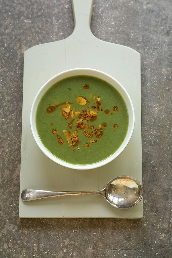 Green Vegetable Soup With Chillied Almond Garnish Photograph by Joy Skipper Foodstyling