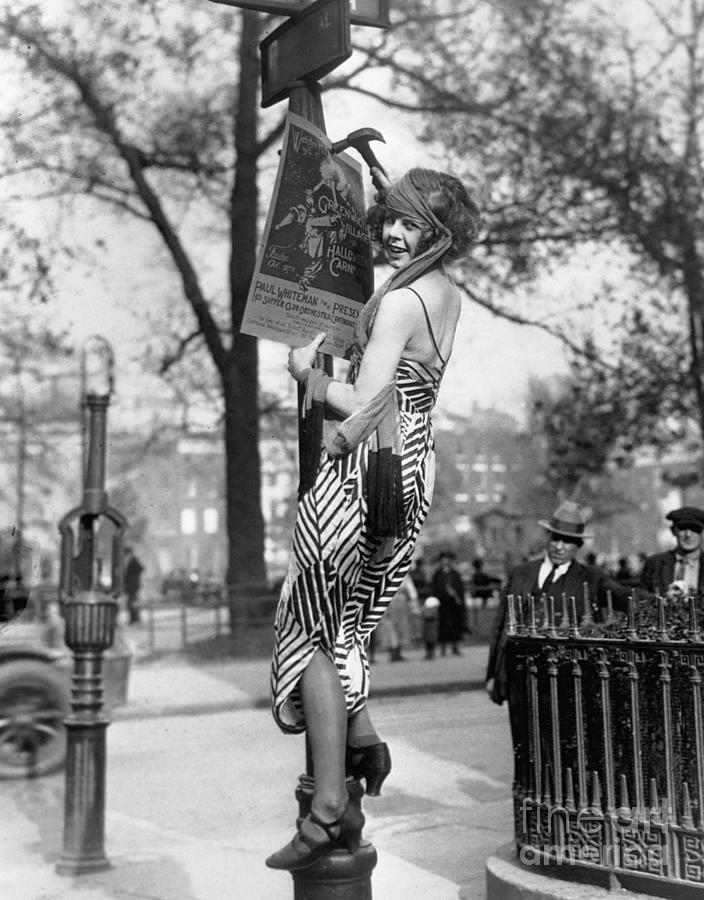 Greenwich Village Woman Hanging Poster Photograph by Bettmann