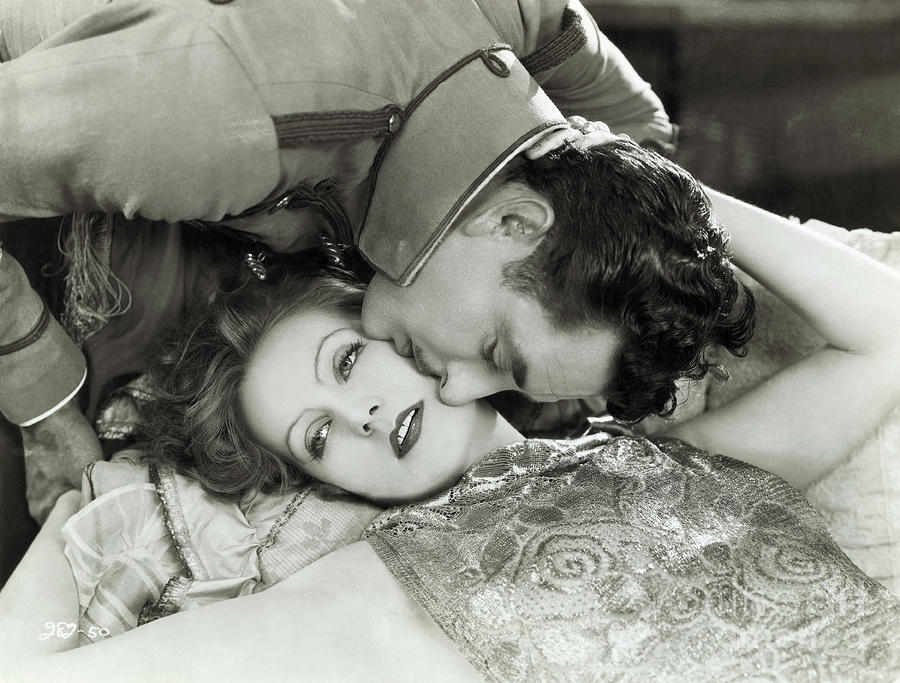 Greta Garbo And John Gilbert Photograph by Bettmann
