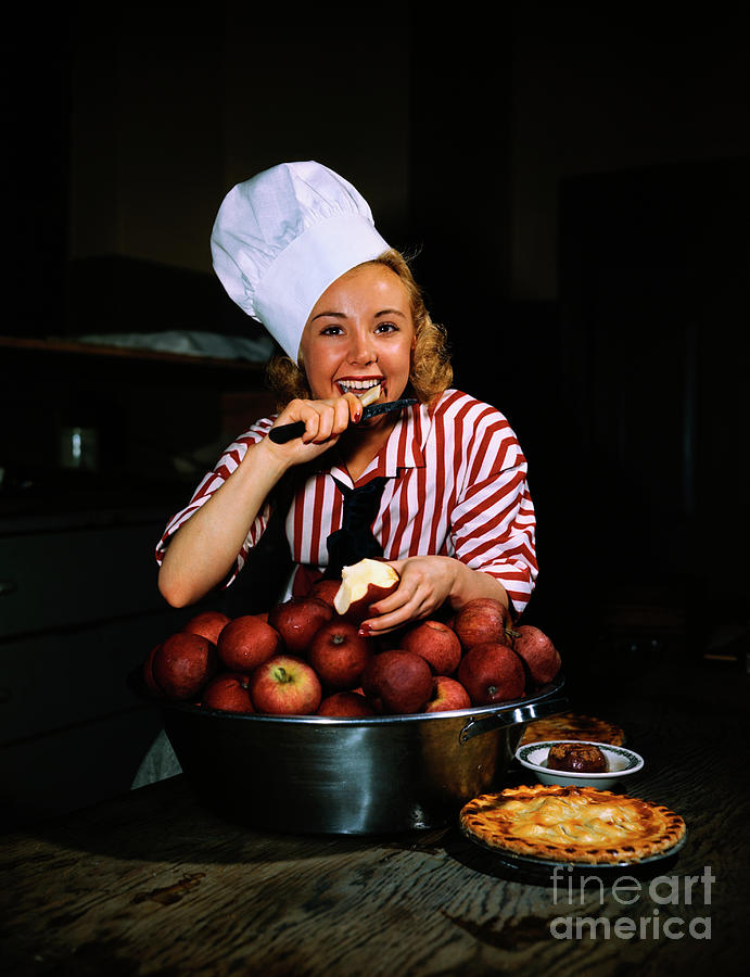 Gretchen Merrill Eating Red Apple Photograph by Bettmann