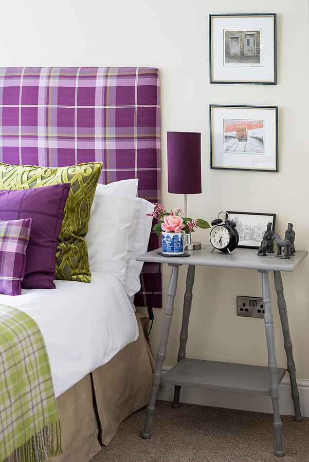 Grey Bedside Table Next To Bed With Purple Tartan Headboard Photograph by Brian Harrison
