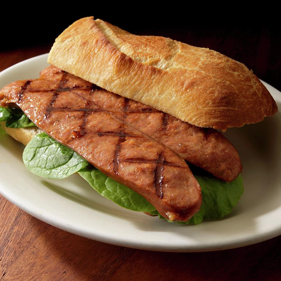 Grilled Andouille Sausage Sandwich On Artisanal Bread Photograph by Paul Poplis
