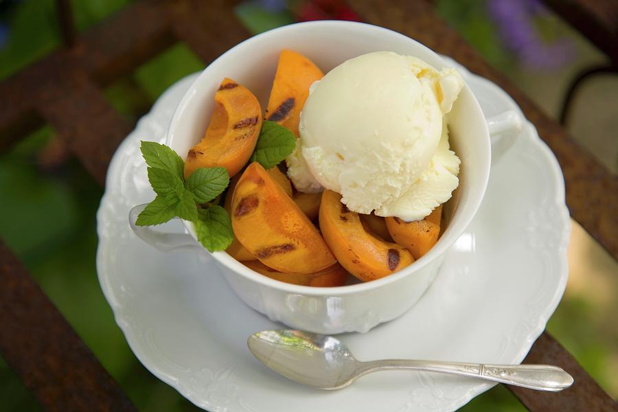 Grilled Apricots With Vanilla Ice Cream Photograph by John Gagne