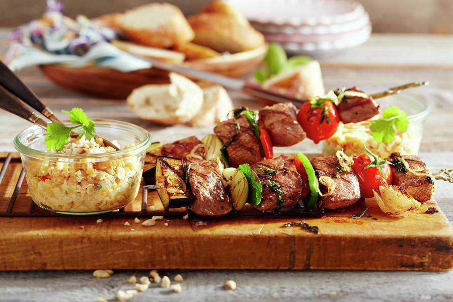 Grilled Arabic Lamb Skewers With A Red Lentil Salad And White Bread On A Wooden Board Photograph by Teubner Foodfoto