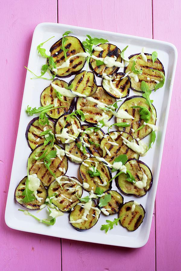 Grilled Aubergine Slices With Tahini And A Yoghurt Dressing Photograph by Tim Pike
