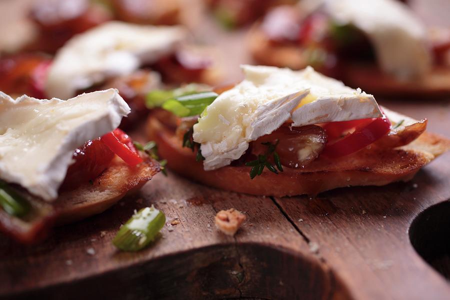 Grilled Bread Topped With Brie And Spicy Dates Photograph by Frank Weymann