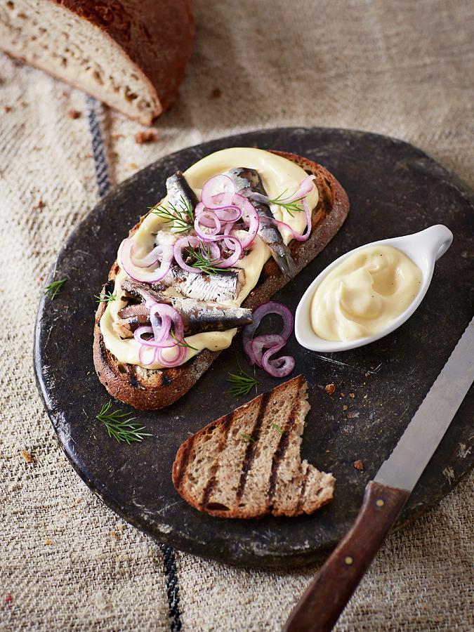 Grilled Bread With Mayonnaise, Sardines In Oil And Onions Photograph by Thorsten Kleine Holthaus