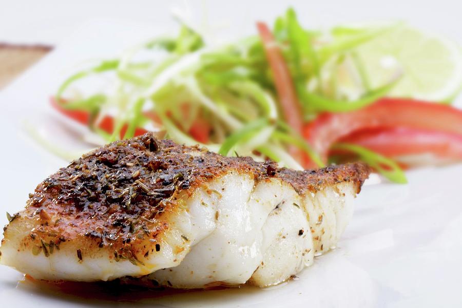Grilled Cajun-style Fish Fillet With A Salad Photograph by Creative Photo Services