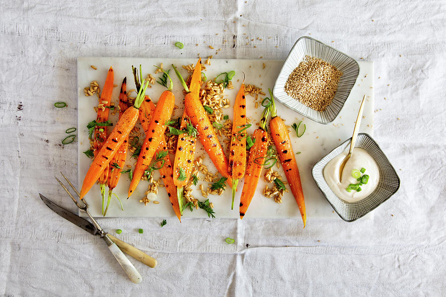 Grilled Carrots With Farro, Spring Onions, Carrot Leaves, Sesame Seeds And A Yoghurt Dip Photograph by Food With A View