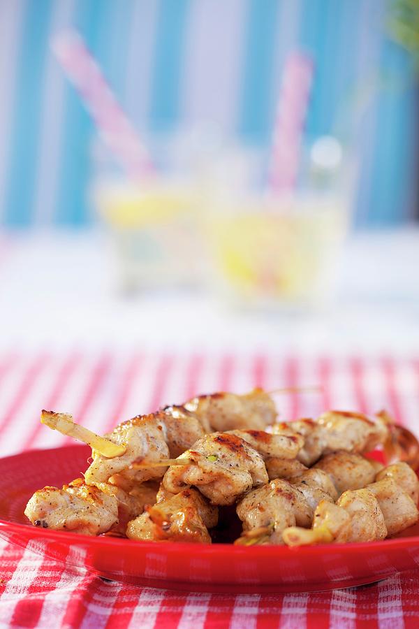 Grilled Chicken Breast Skewers On A Plate Photograph by Studio Lipov