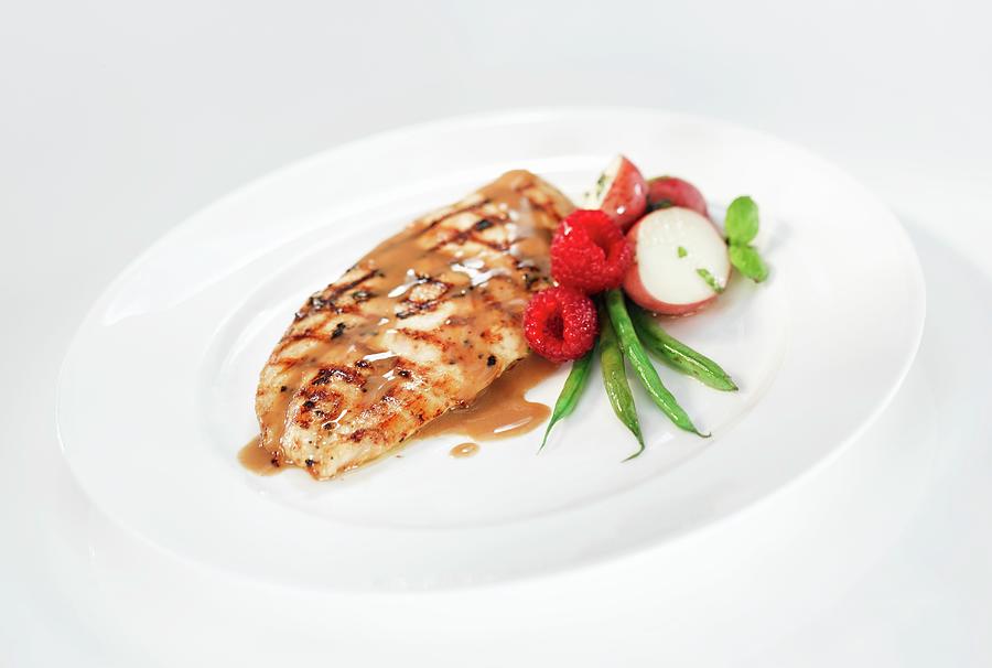 Grilled Chicken Breast With A Raspberry And Balsamic Sauce Photograph by Glenn Moores
