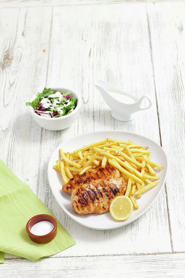Grilled Chicken Breast With Chips And Salad Photograph by Rua Castilho